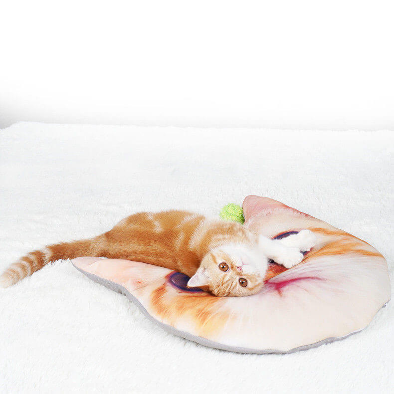 Cat relaxing on custom die-cut pet face shaped floor mat, personalized pet photo rug