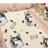 Custom husky face pattern fleece blanket on bed