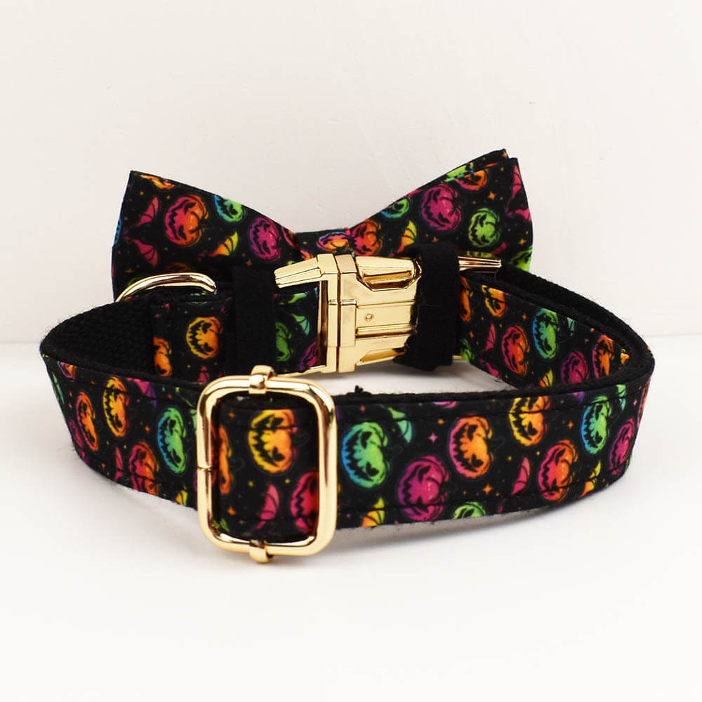 Adjustable Halloween pumpkin dog collar displaying the metal slide adjuster