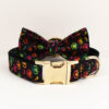 Personalized Halloween colorful pumpkin dog collar featuring an attached bow tie and gold hardware