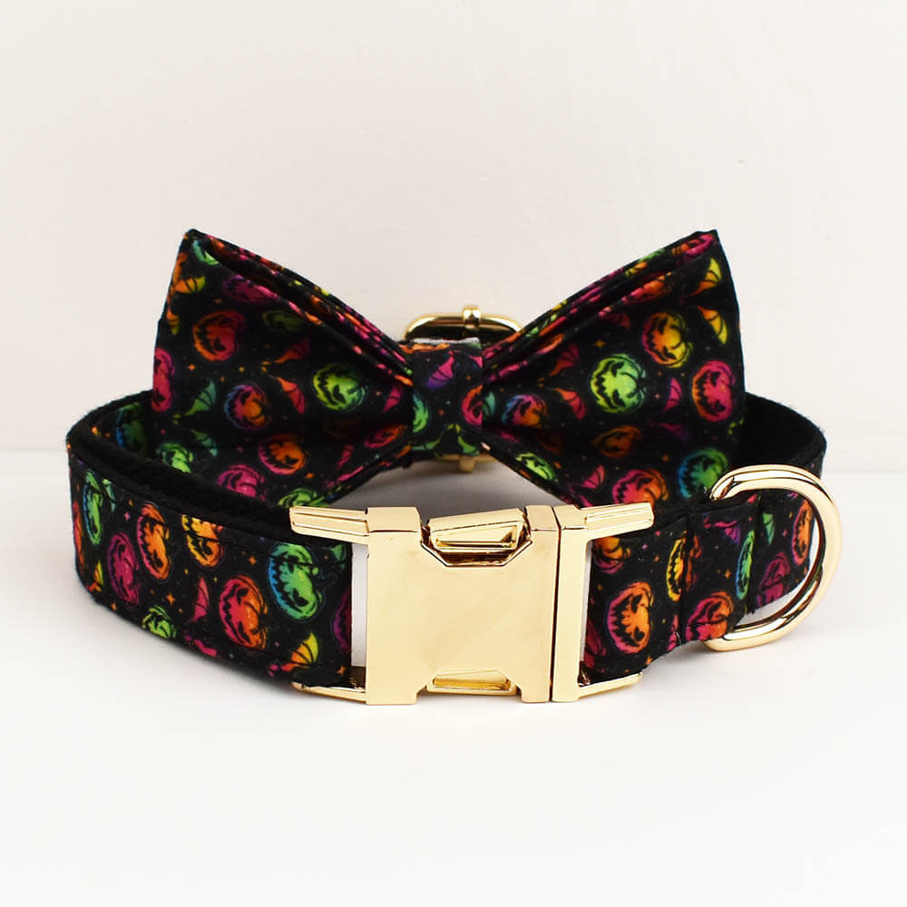 Personalized Halloween colorful pumpkin dog collar featuring an attached bow tie and gold hardware